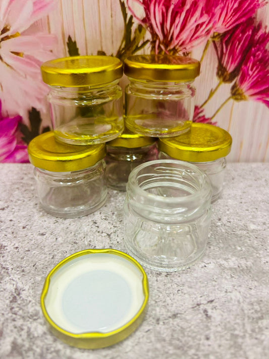 Envase de Vidrio Redondo Pequeño con Tapa Dorada